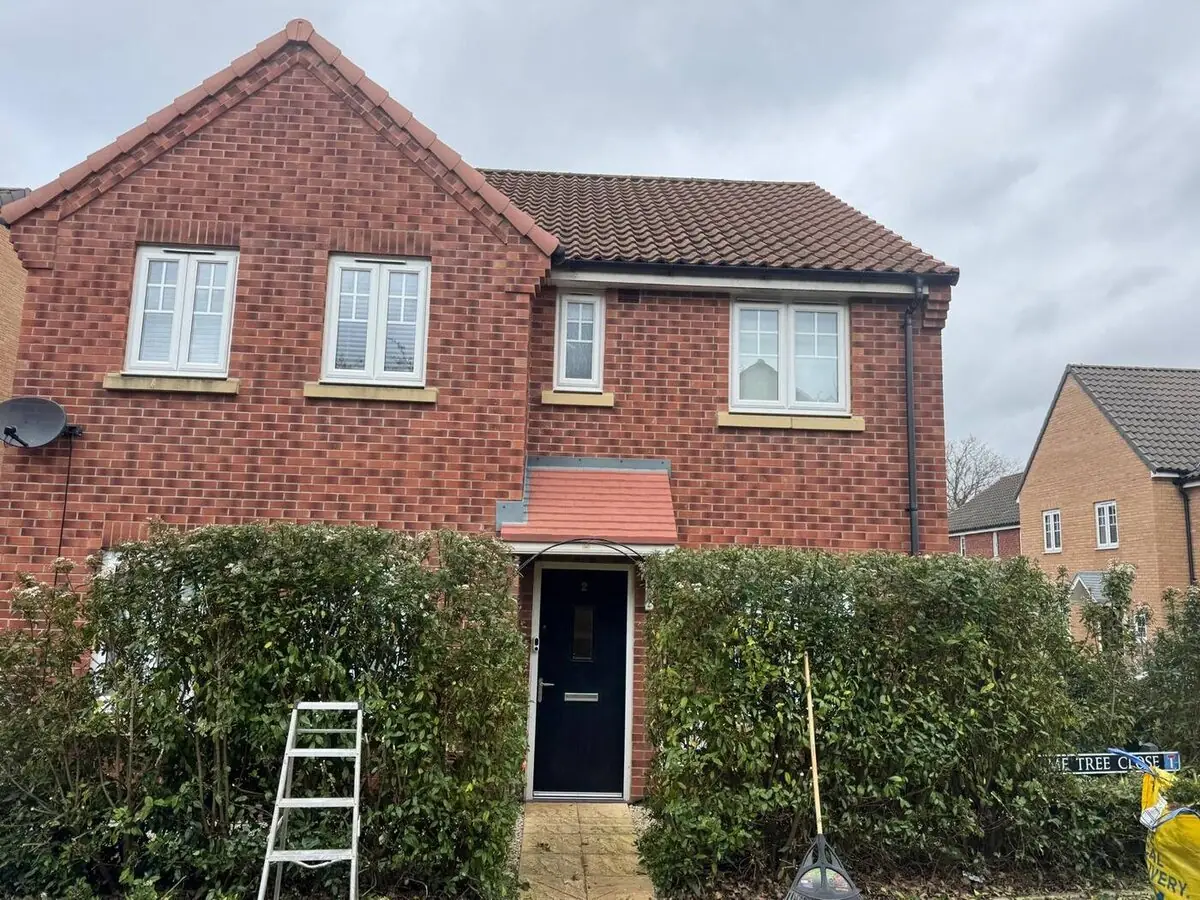 Hedge reshaping at a Norfolk family home